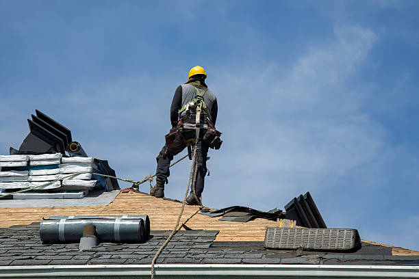 Professional Storm Damage Roof Repair technician working in Kent, OH